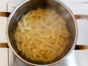 Pasta boiling in a pot of water