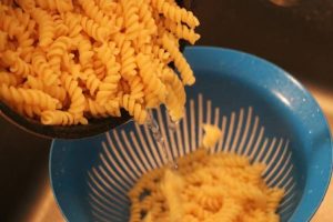 draining pasta