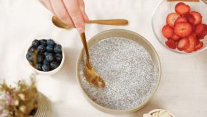 chia seeds and milk being mixed