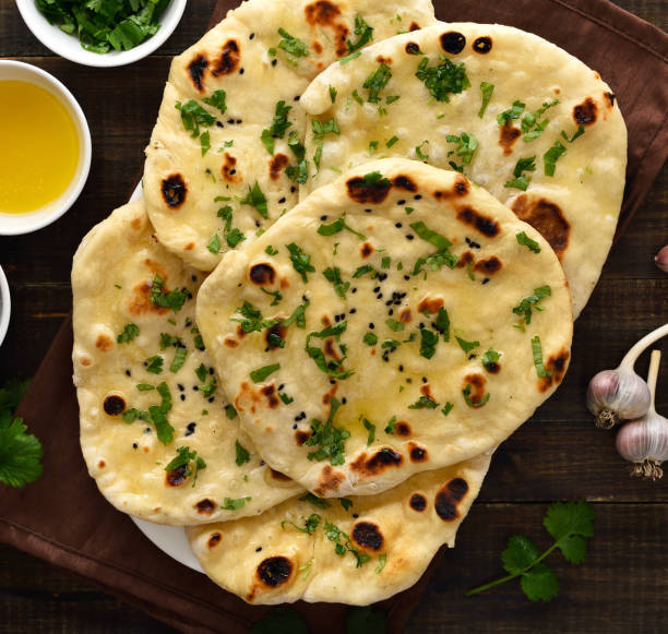 Naan bread with butter and herbs on top