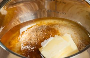 Butter, cinammon, flour in a metal bowl