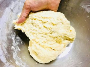 Kneading Dough in Mixing Bowl